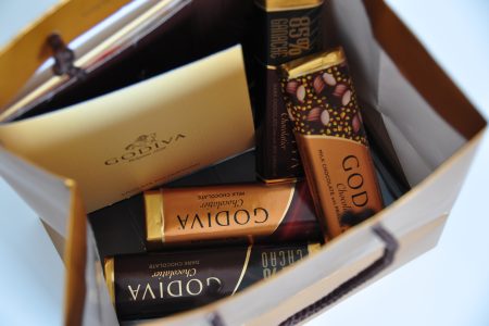 "Ankara, Turkey - March 11, 2012: A variety of Godiva Chocolate Bars in a bag. Godiva Chocolatier is a manufacturer of chocolates founded in Belgium in 1926."