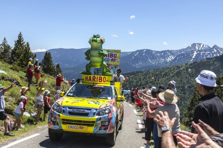 Port de Pailheres,France- July 06 2013:Haribo car during the passing of the advertising caravan on the climbing route to mountain pass Pailhere in Pyrenees Mountains during the 8th stage of the 100 edition of Le Tour de France, the biggest cycling race in the world, on 6th July 2013. Before the appearance of the cyclists there is a caravan of advertising cars of the all sponsors of the competition.Haribo is the biggest manufacturer of gummy and jelly sweets in the world.